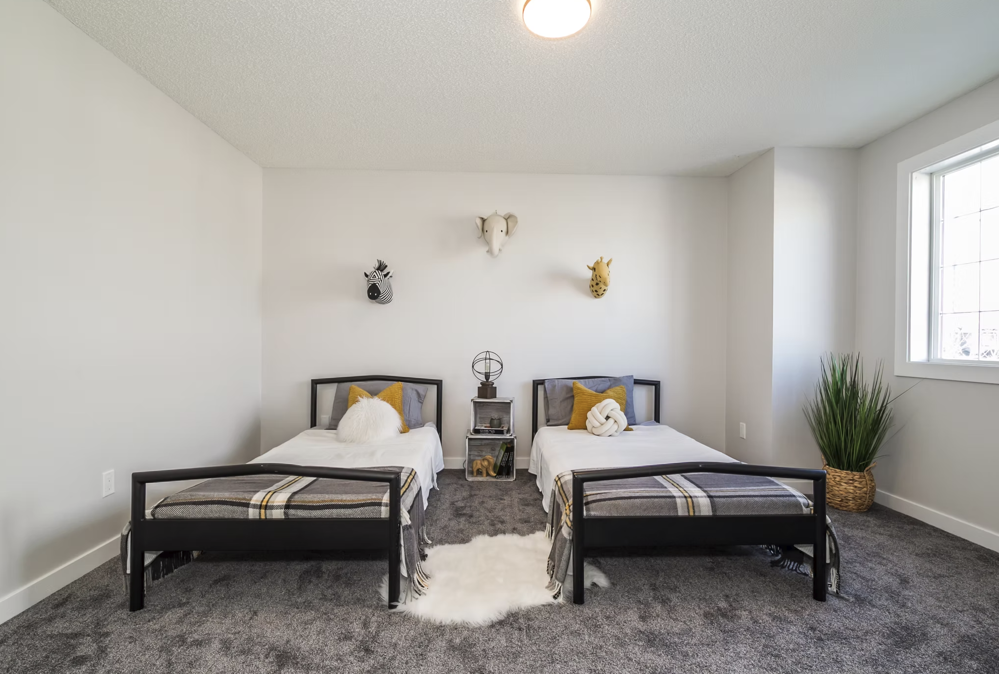 Staged children's bedroom with twin beds